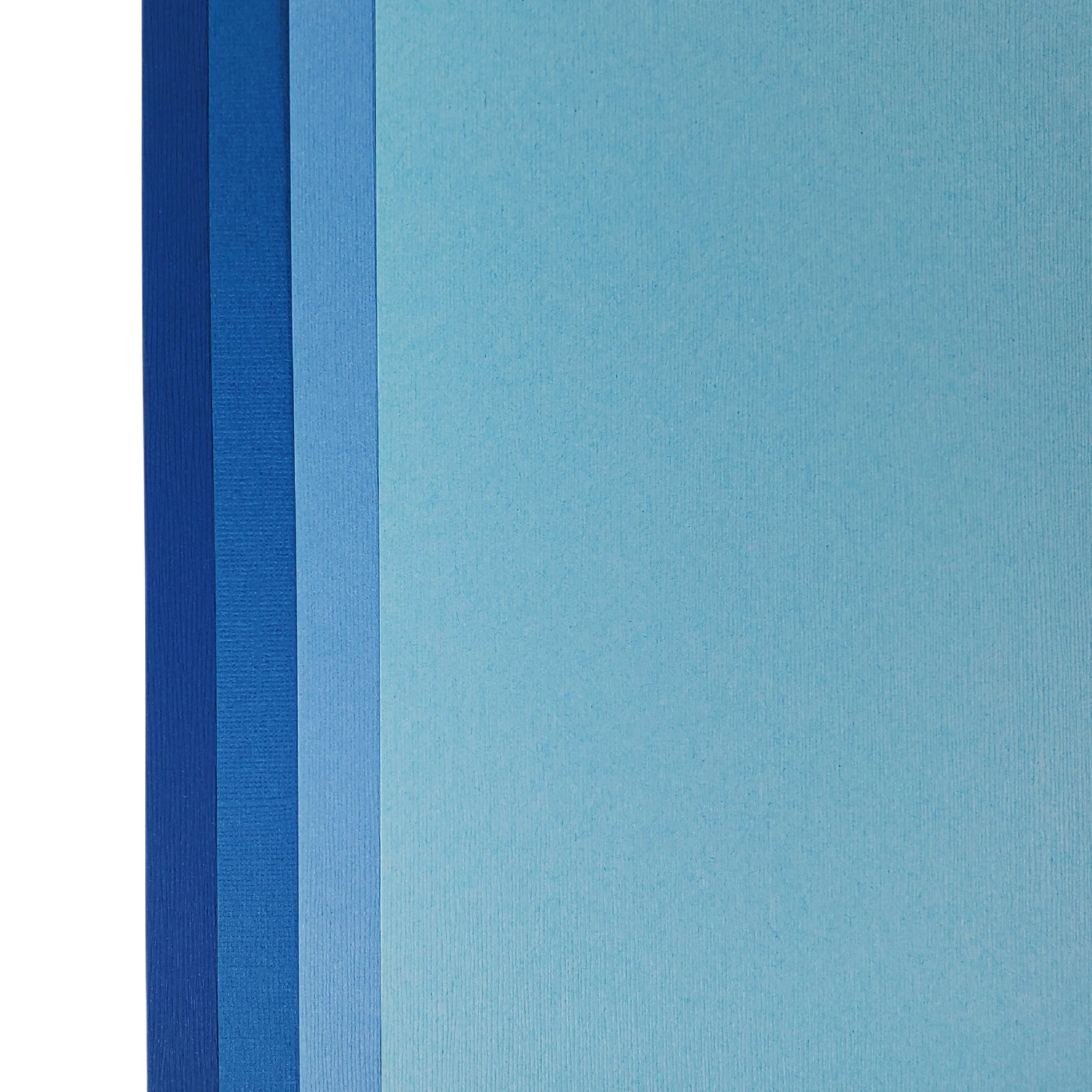 The Blue monochromatic assortment includes three (3) each of four (4) shades of blue colors of Bazzill textured cardstock.