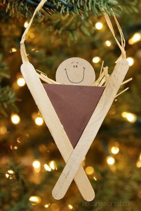 Baby Jesus Christmas ornament made with cardstock and Popsicle sticks