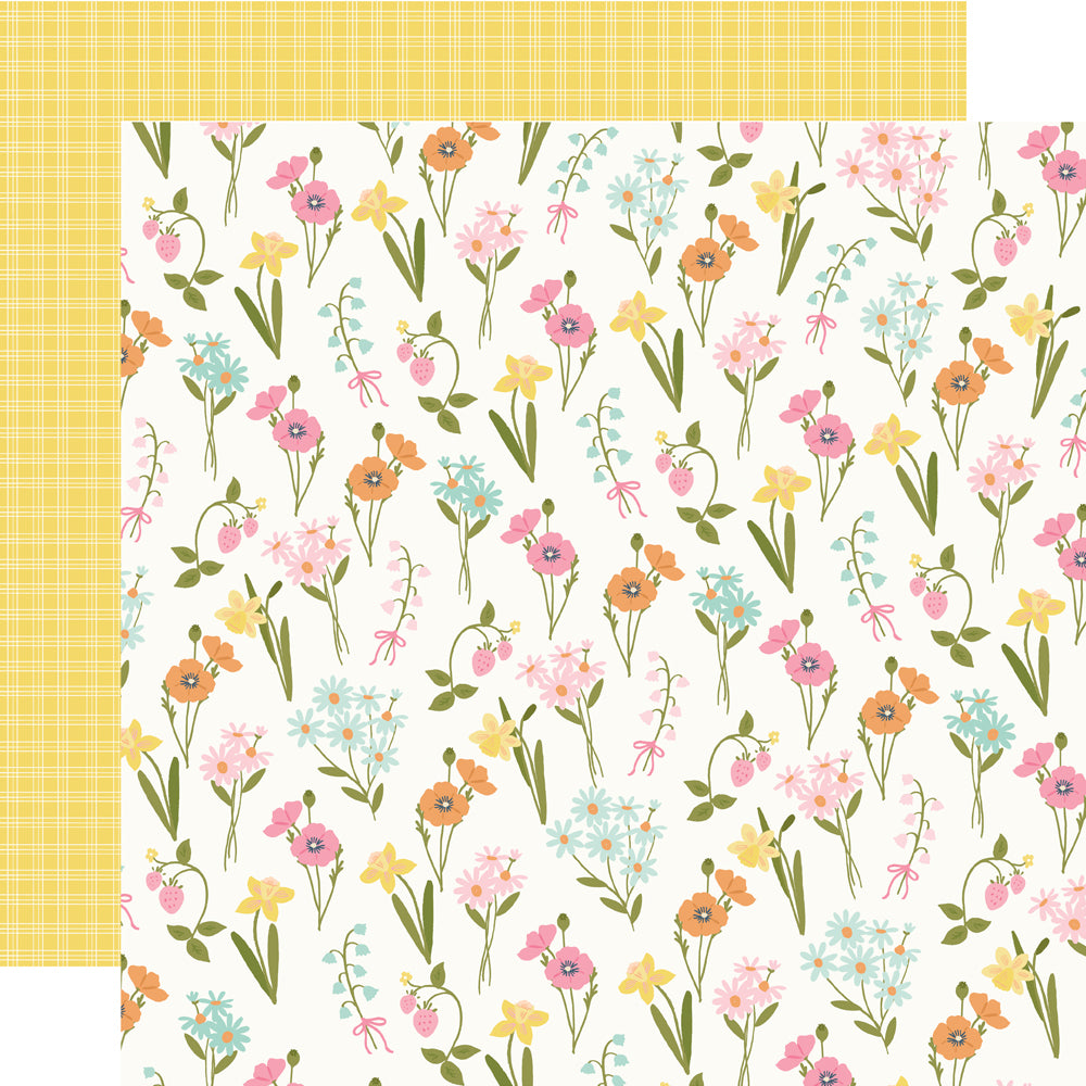 Floral-patterned paper with a yellow plaid reverse.