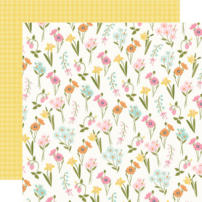 Floral-patterned paper with a yellow plaid reverse.