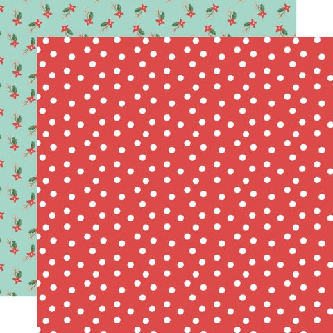Two sheets of paper with different patterns: one red with white polka dots and the other with a green and red floral design on a light blue background.