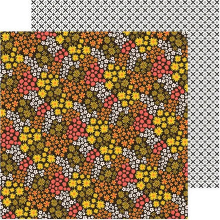 one side with a floral pattern and the other side with a geometric pattern.