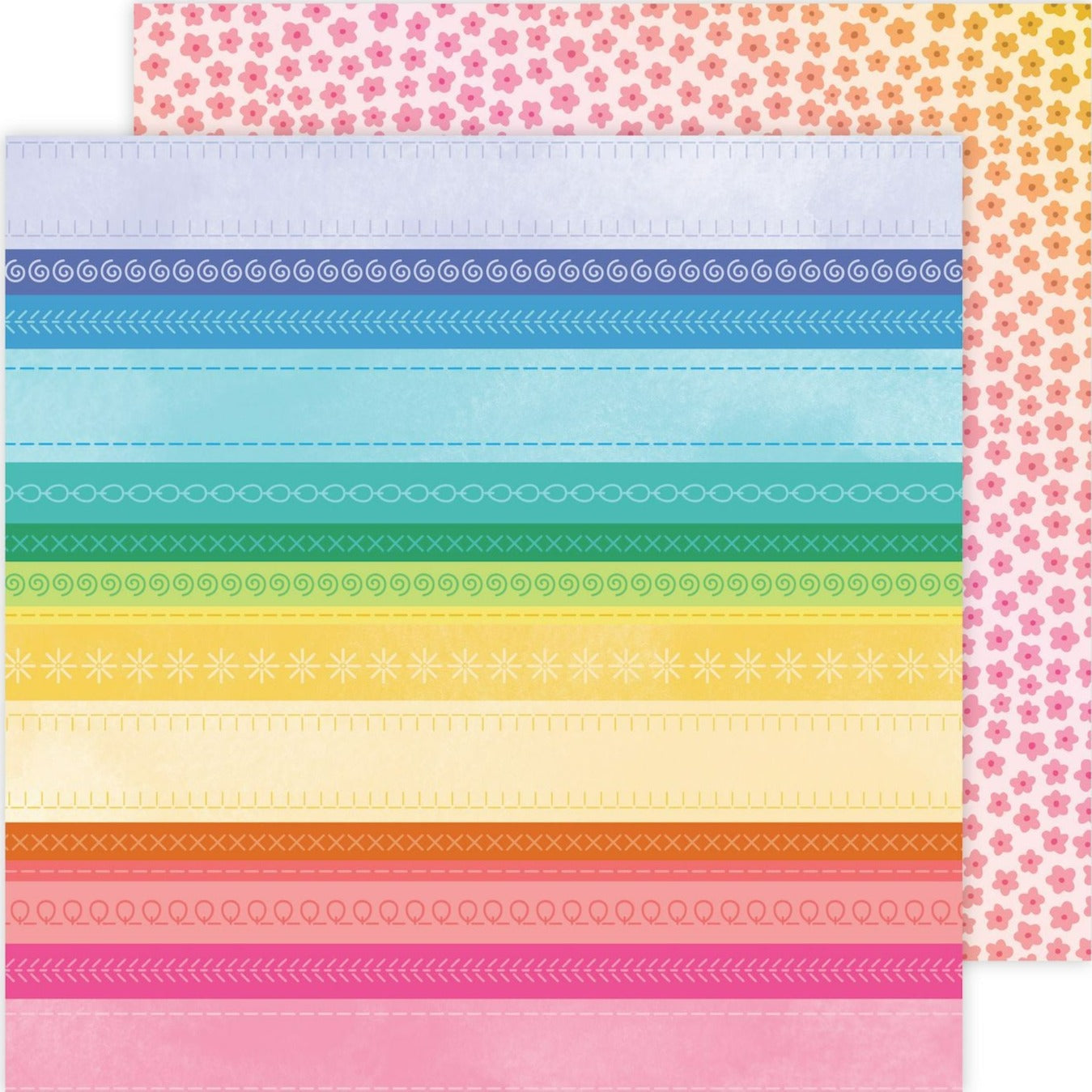 (Side A - stripes in a rainbow of colors with patterns in each stripe, Side B - small flowers on a pink to yellow ombre background)