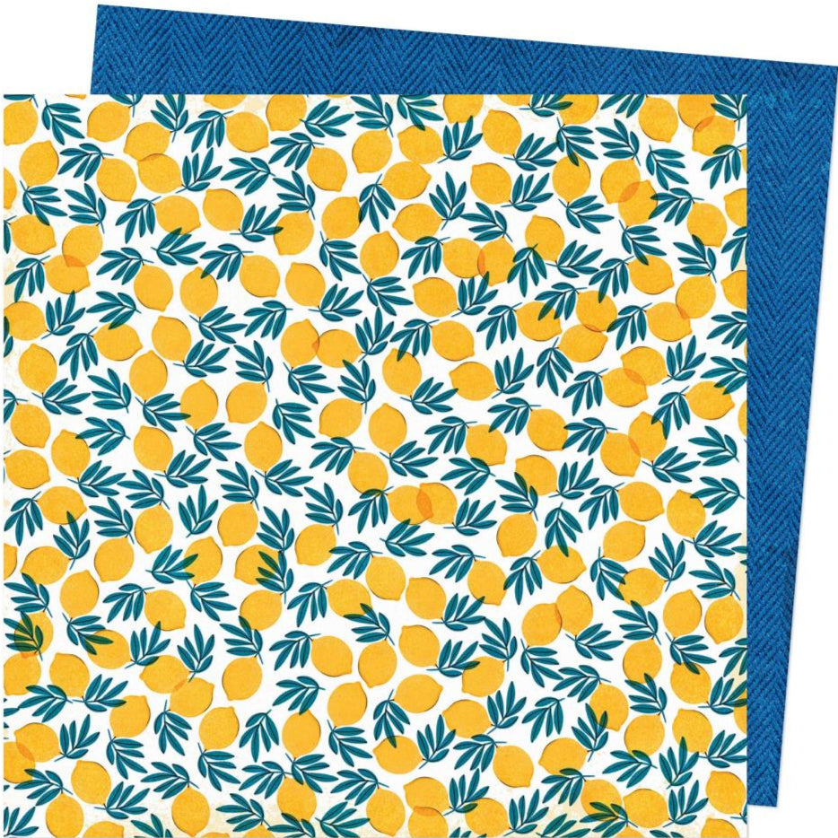 Patterned paper with yellow lemons and green leaves on a white background with a blue denim pattern reverse.