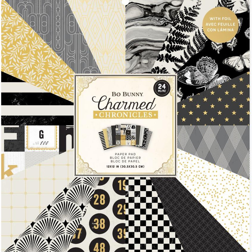 Bo Bunny Charmed Chronicles paper pad with various patterned papers with foil accents.