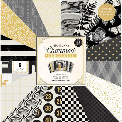 Bo Bunny Charmed Chronicles paper pad with various patterned papers with foil accents.