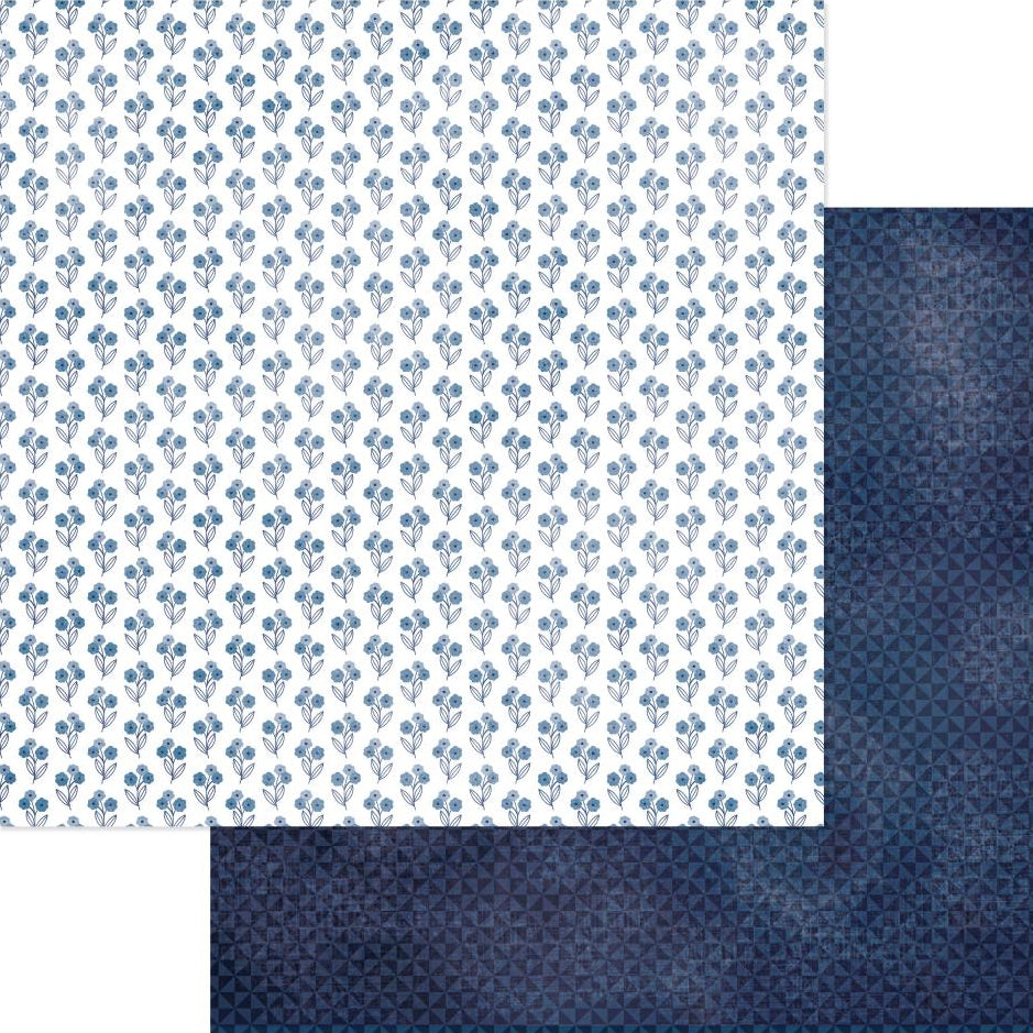 (Side A - a delicate, repeating pattern of small blue floral sprigs on a white background. Side B - a dark blue background with a subtle geometric pattern of repeating squares and triangles, giving it a textured look)