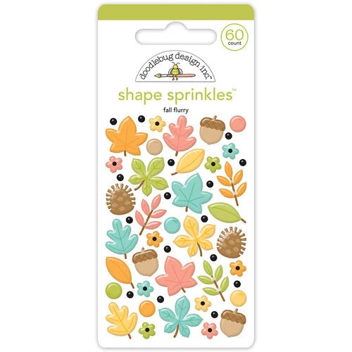 Introducing the Fall Flurry Shape Sprinkles by Doodlebug Design! Add a delightful touch to your crafts and projects with these self-adhesive enamel shapes. Bursting with love and charm, this set features a variety of adorable fall leaves, acorns, pinecones, and flower-shaped designs in pastel colors. 