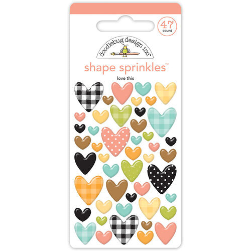 Forty-seven self-adhesive enamel heart shapes. Shapes are self-adhesive and come in five different colors from Doodlebug Design.
