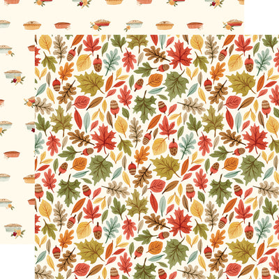 Leaves in blue, mustard, olive green, and red on an off-white background. The reverse is rows of Thanksgiving pies on an off-white background. 80 lb cover. Felt texture.