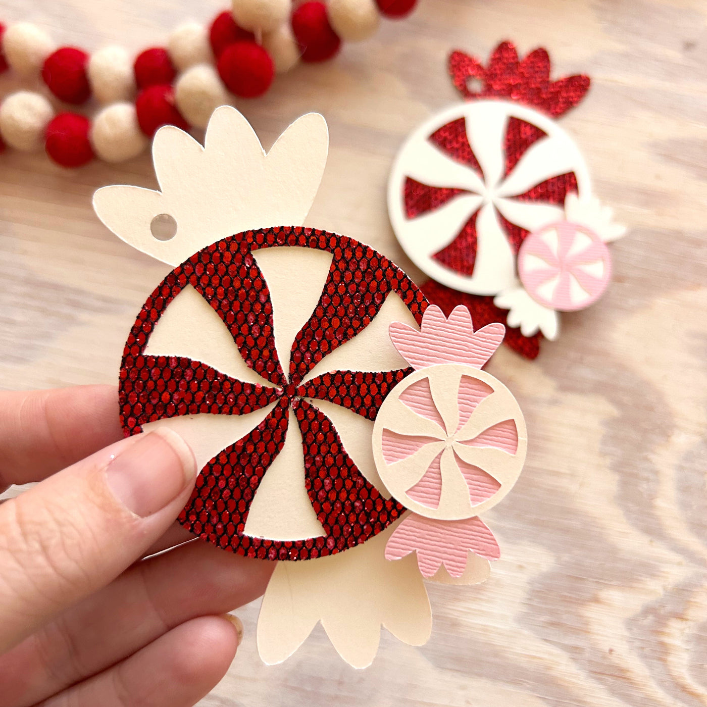 decorative peppermint paper craft using red sequin cardstock