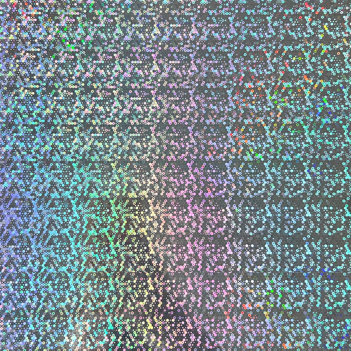 Confetti Rings Holographic Cardstock - 12x12 silver holographic cardstock with a small ring pattern