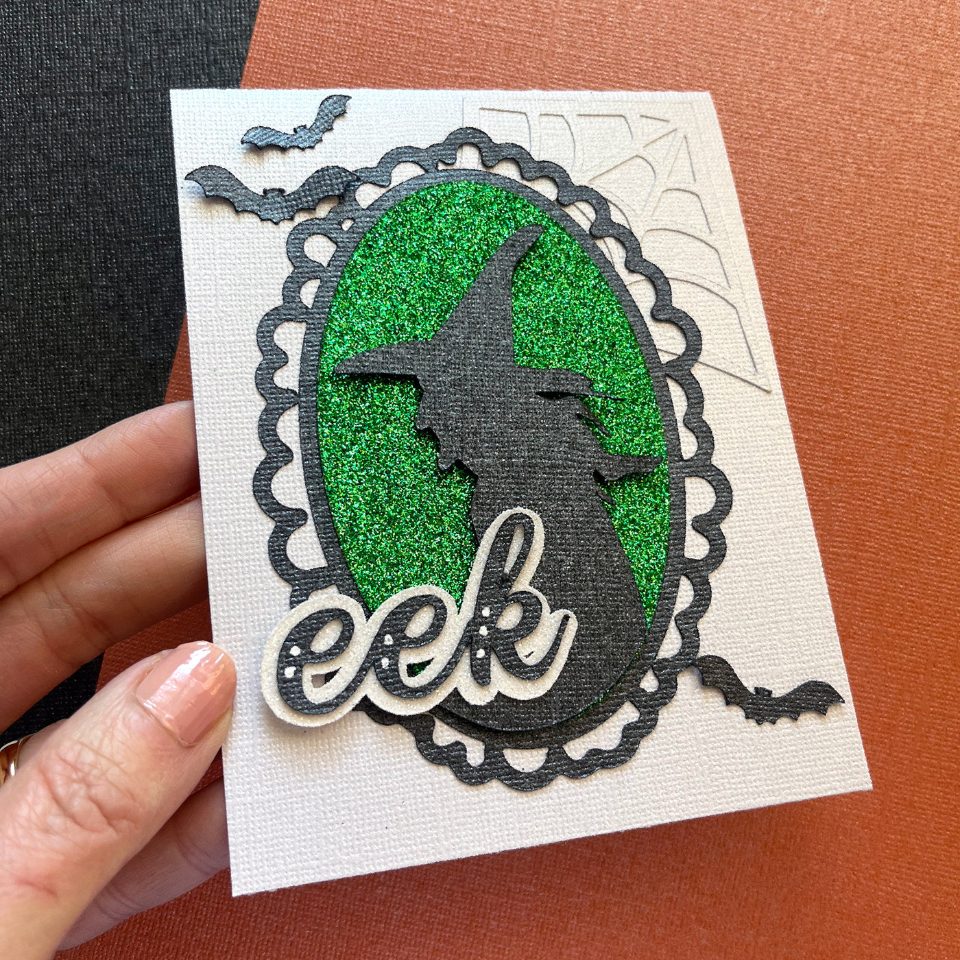 Handmade card featuring Encore Shimmer Cardstock in black and Emerald Glitter Luxe Glitter cardstock