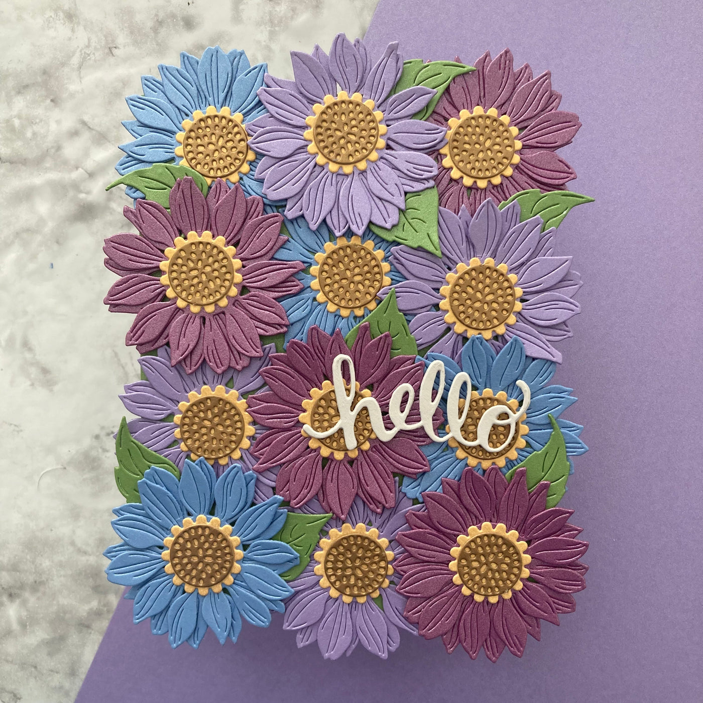 Handmade card featuring flower dies cut from Neenah Stardream in Amethyst