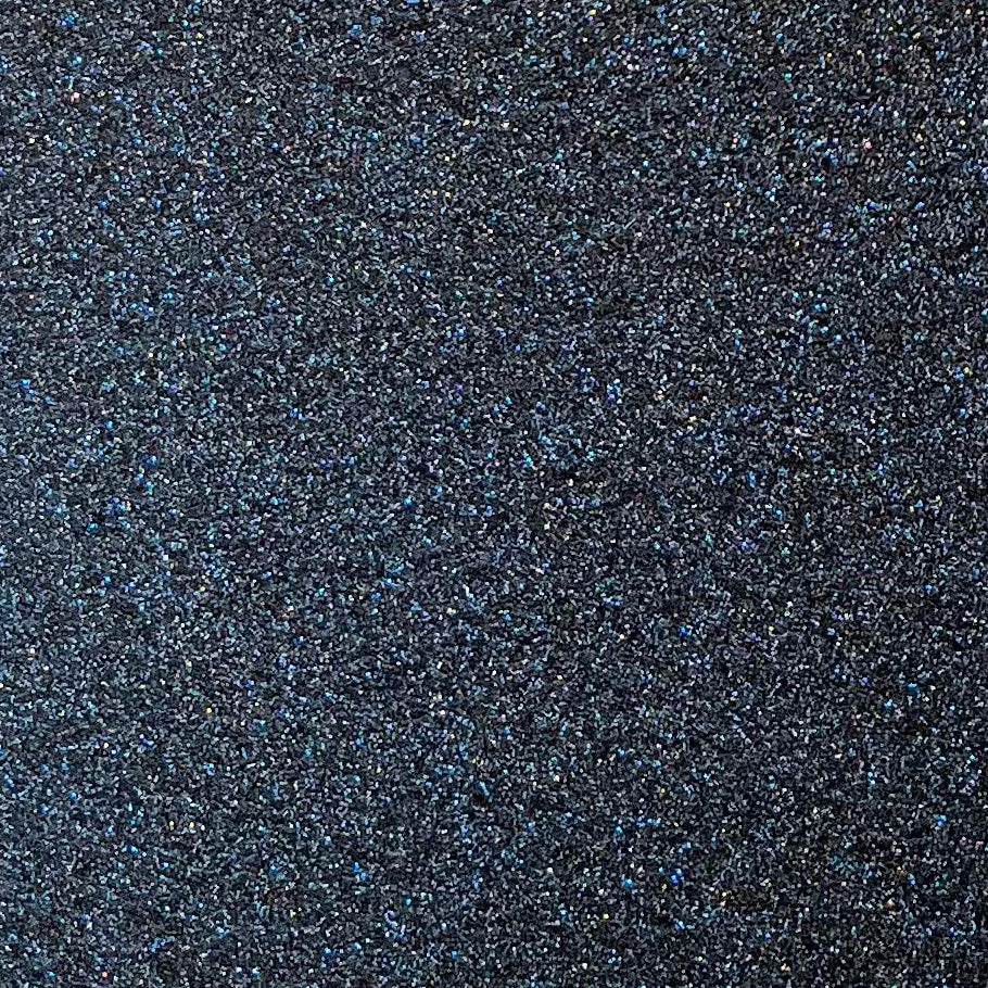 High-shine black glitter cardstock with flecks of blue glitter