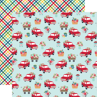 Patterned paper with red trucks and floral arrangements on a blue background, with a plaid pattern, reverse.