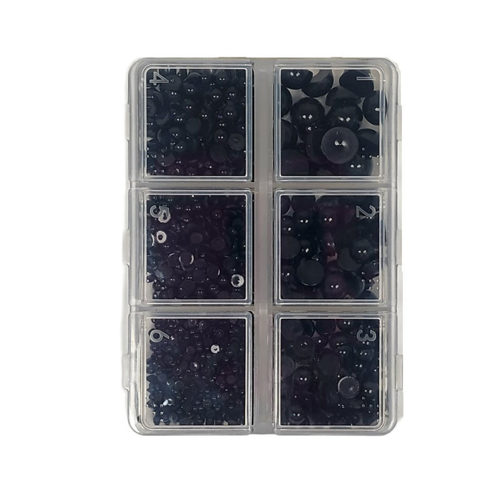 Small bright black pearl embellishments for papercraft projects in a handy storage container. One thousand pieces of mixed-size flat-backed pearls for your paper projects.