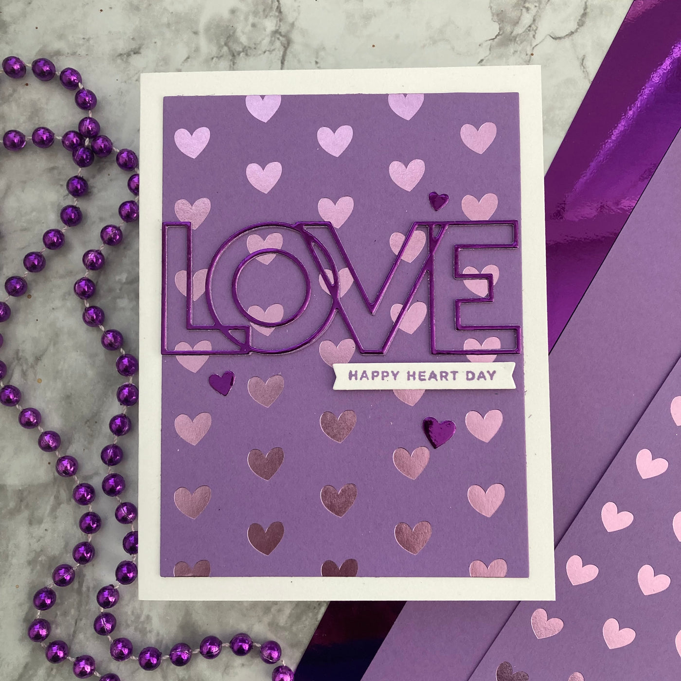 handmade valentine card featuring purple foil