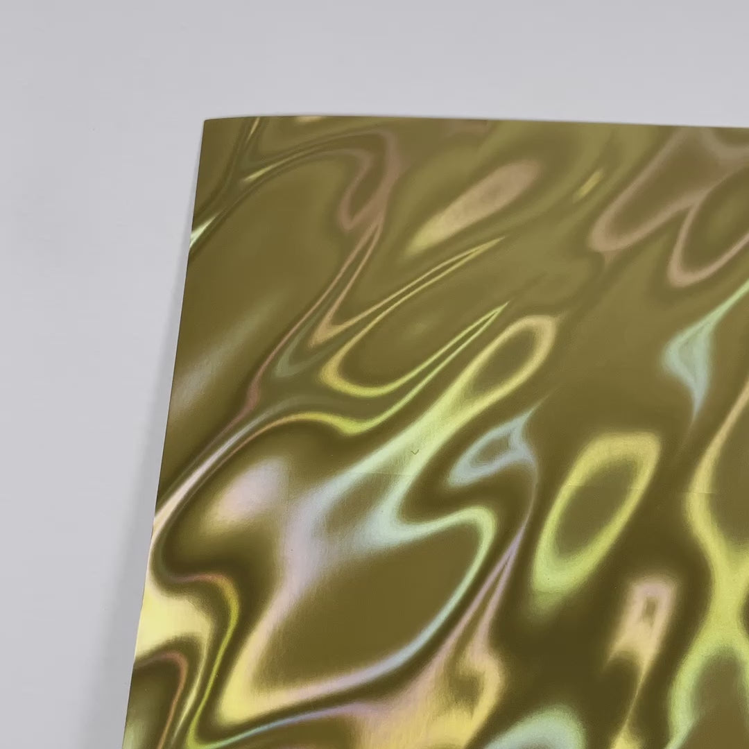 Gold Holographic Cardstock with a flowing lava finish