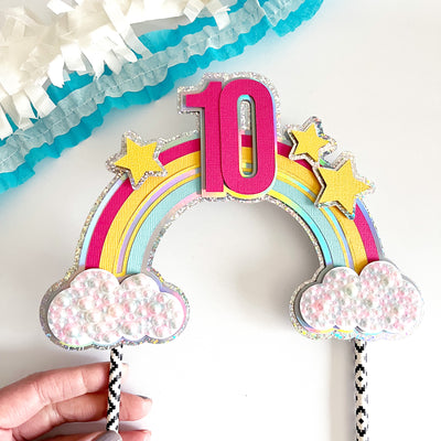 Unicorn mini pearl rhinestones on a rainbow themed cake topper