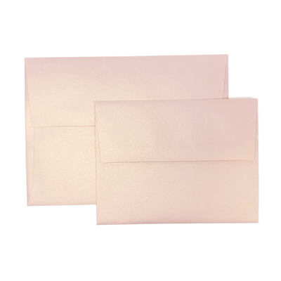 Blush pink metallic envelope with pearlescent finish that instantly elevates your handmade invitations. Pearlescent pink envelopes for wedding invitations and more.