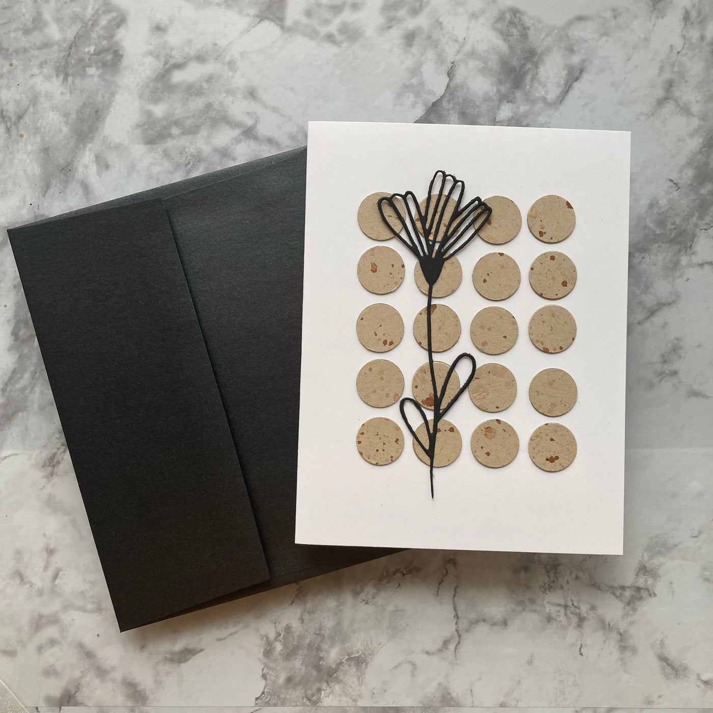 handmade card with a pearlescent black envelope