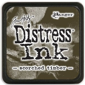 Distress Ink pad by Ranger in 'scorched timber' color.