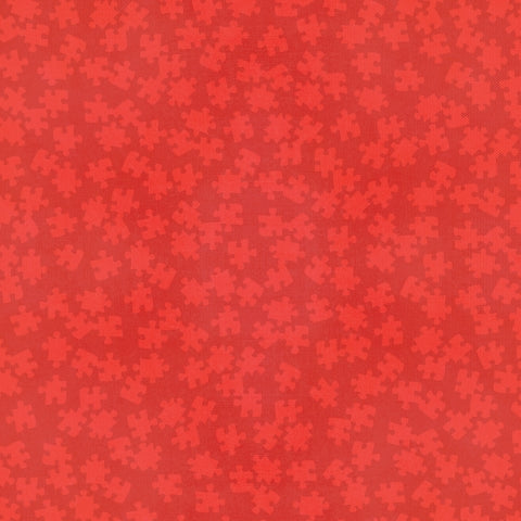 Side B - bright red puzzle pieces on a red background