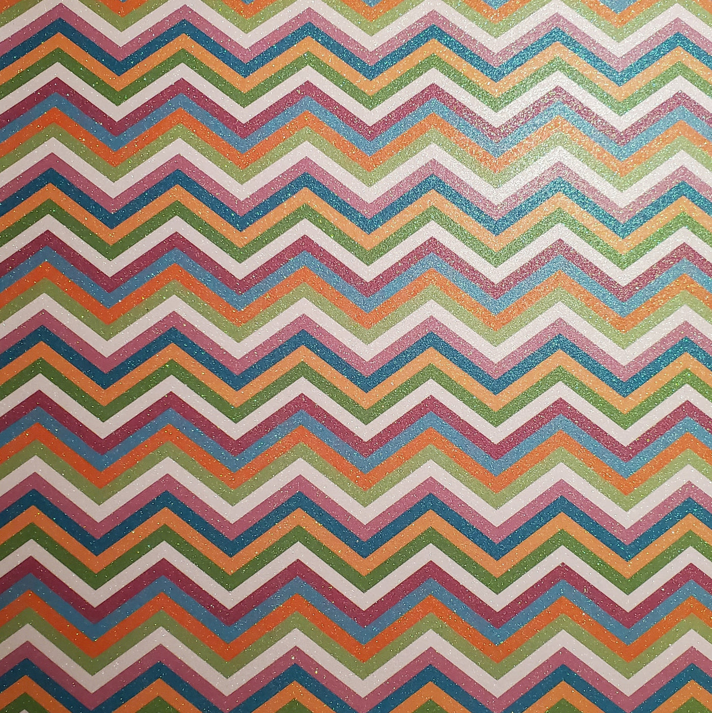 Multi-colored - Glittery Chevron print in colors of white, lime green, orange, blues, and purples.