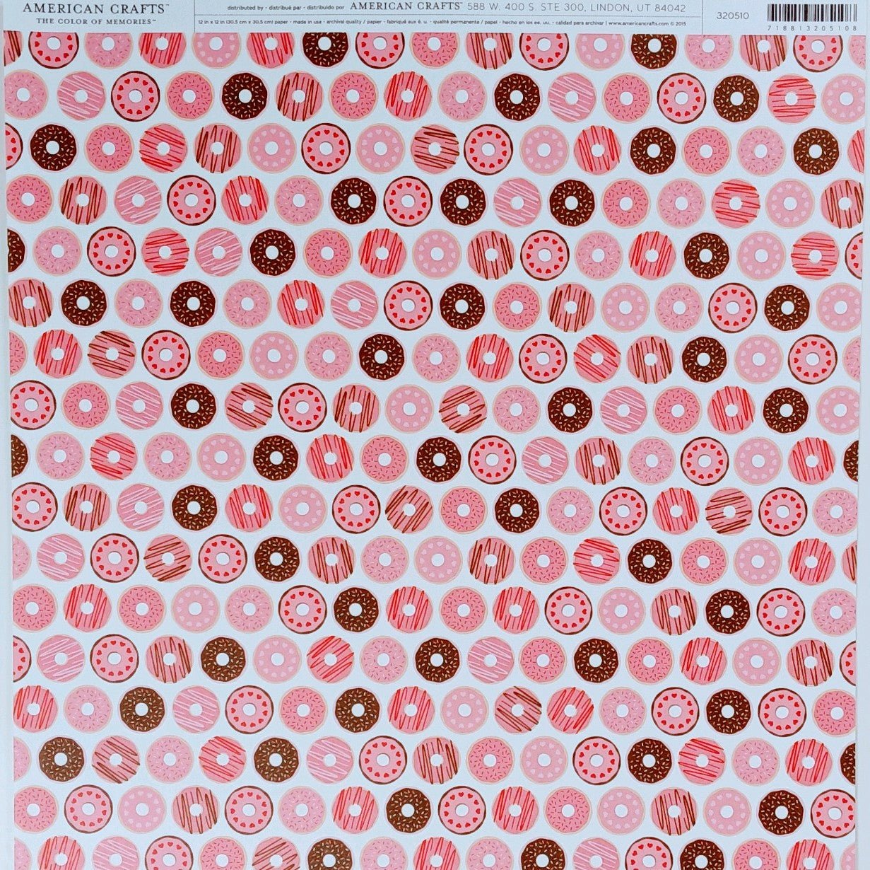 Multi-Colored (rows of Valentine donuts, with frosting in pastel pinks and brown on white background)