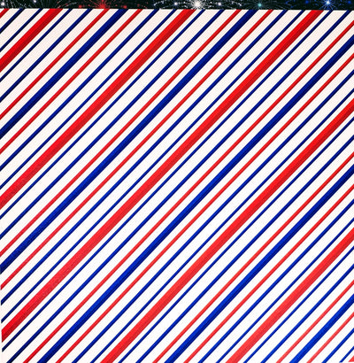 Side B - red, white and blue slanted stripes on white background.