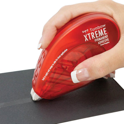 Applying line of Tombow Xtreme Permanent Adhesive with tape runner