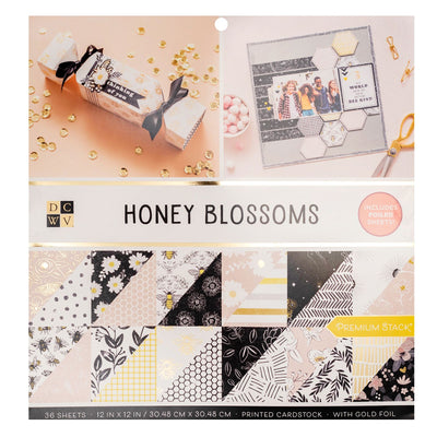 The Honey Blossoms stack features bright yellow, white, and black to complement bee and flower patterns. This stack includes 36 sheets of 12x12-inch paper, double-sided, with gold foil accents.