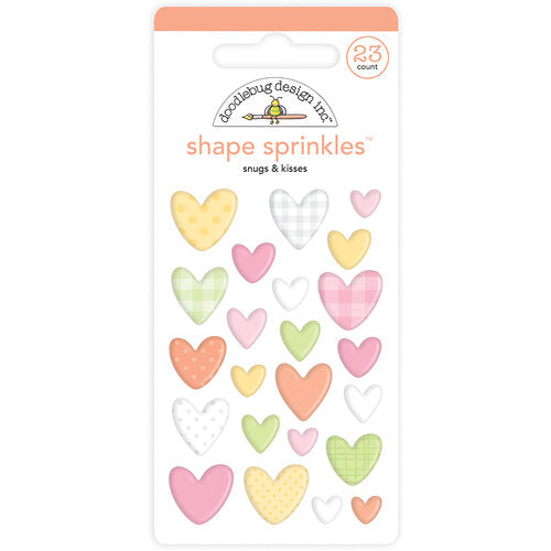 SNUGS & KISSES Shape Sprinkles - Self-Adhesive Enamel Shapes from Doodlebug Design - 23 self-adhesive enamel heart shapes. Shapes are self-adhesive and come in eight different colors from Doodlebug Design.