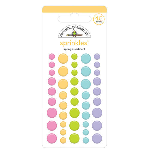 This package contains 45 self-adhesive enamel stickers in 5 colors. These stickers are 4, 6, and 8 mm in size, 3 each of 3 sizes. From Doodlebug Design.