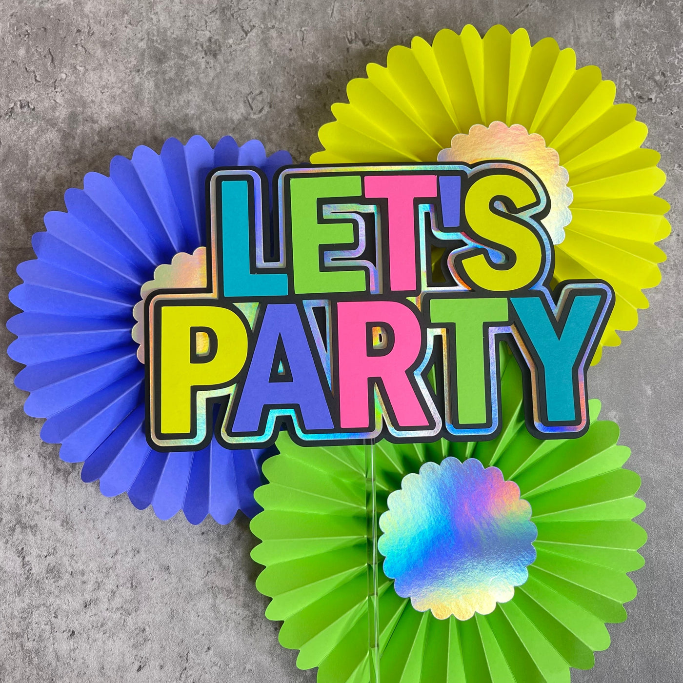 neon party rosettes made with Astrobrights cardstock