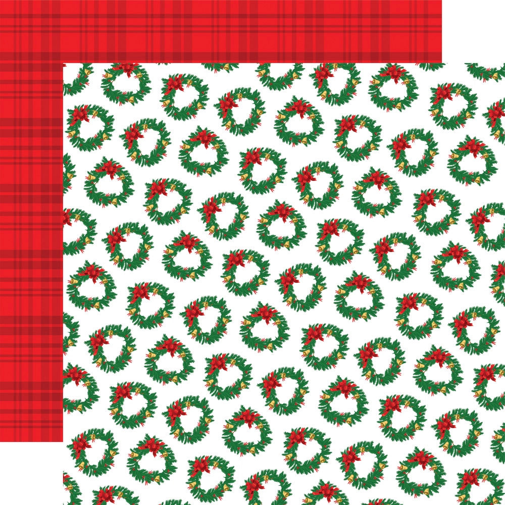 Double-sided 12x12 cardstock with green wreaths and red bows on a white background; the reverse is bright red on red plaid.
