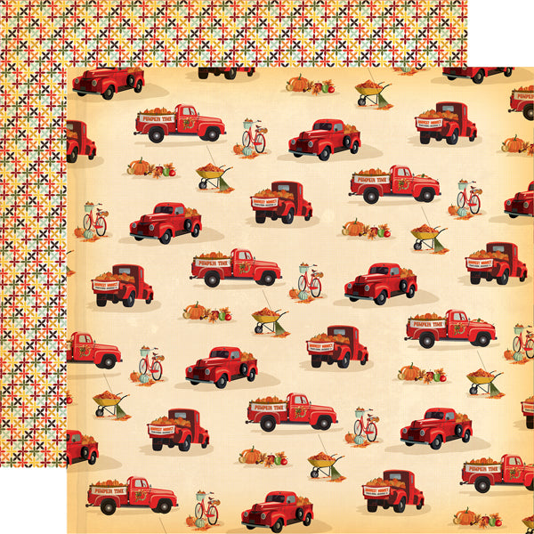 (Side A - red trucks filled with pumpkins in fall colors on an off-white background, Side B - cross stitch pattern in fall colors on an off-white background)
