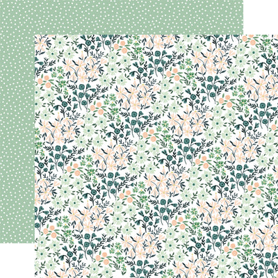 The front side of this paper is filled green and peach colored small flowers and the reverse side is a green background with white dots. 