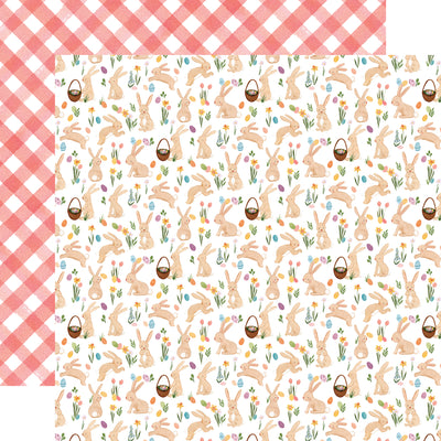 The front side of this paper is full of cute bunnies in different poses, some holding an Easter basket, with plenty of flowers and Easter eggs all around. The reverse side is a pink and white diagonal plaid.