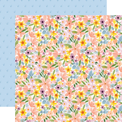 The front side of this paper is full of water colored flowers in pastel colors and the reverse side has rows of cottontail bunnies on a blue background.