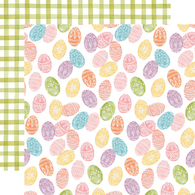 The front side of this paper is full of water colored eggs in pastel colors, and all the eggs have flowers painted on them. The reverse side is a green and white gingham print.