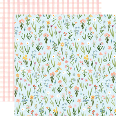 The front side of this paper is light blue with lots of pastel colored flowers. The reverse side is a light pink gingham pattern. 