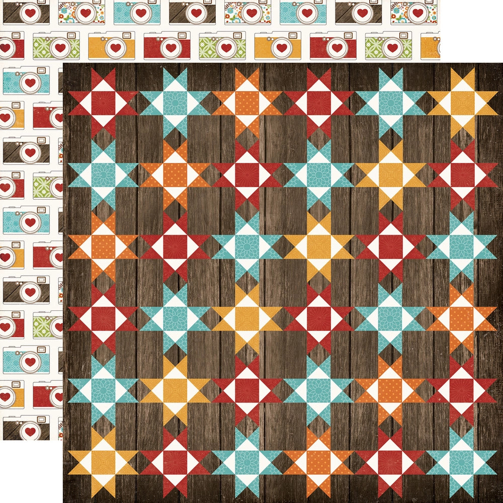 Multi-Colored (Side A - dark red, turquoise, orange, and golden yellow quilt squares on a dark brown woodgrain background, Side B - rows of cameras in coordinating colors with red hearts in the lens on an off-white background)