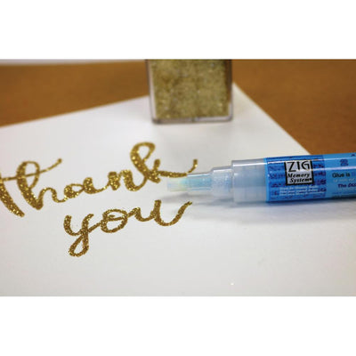 Glitter applied to words written with Zig 2 Way Chisel Tip Glue Pen