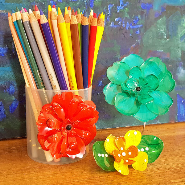 Moldable, 3D flowers made with Grafix Craft Plastic and acrylic paints
