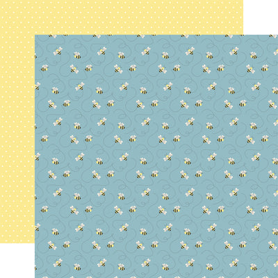  The front side of this paper is blue with lots of buzzing bees leaving trails on the paper. The reverse side is a yellow and white Swiss dot pattern.
