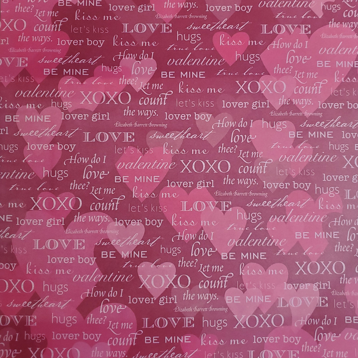 Multi-Colored. Valentine words, varying sizes, pale pink words on red with fuchsia pink hearts background.