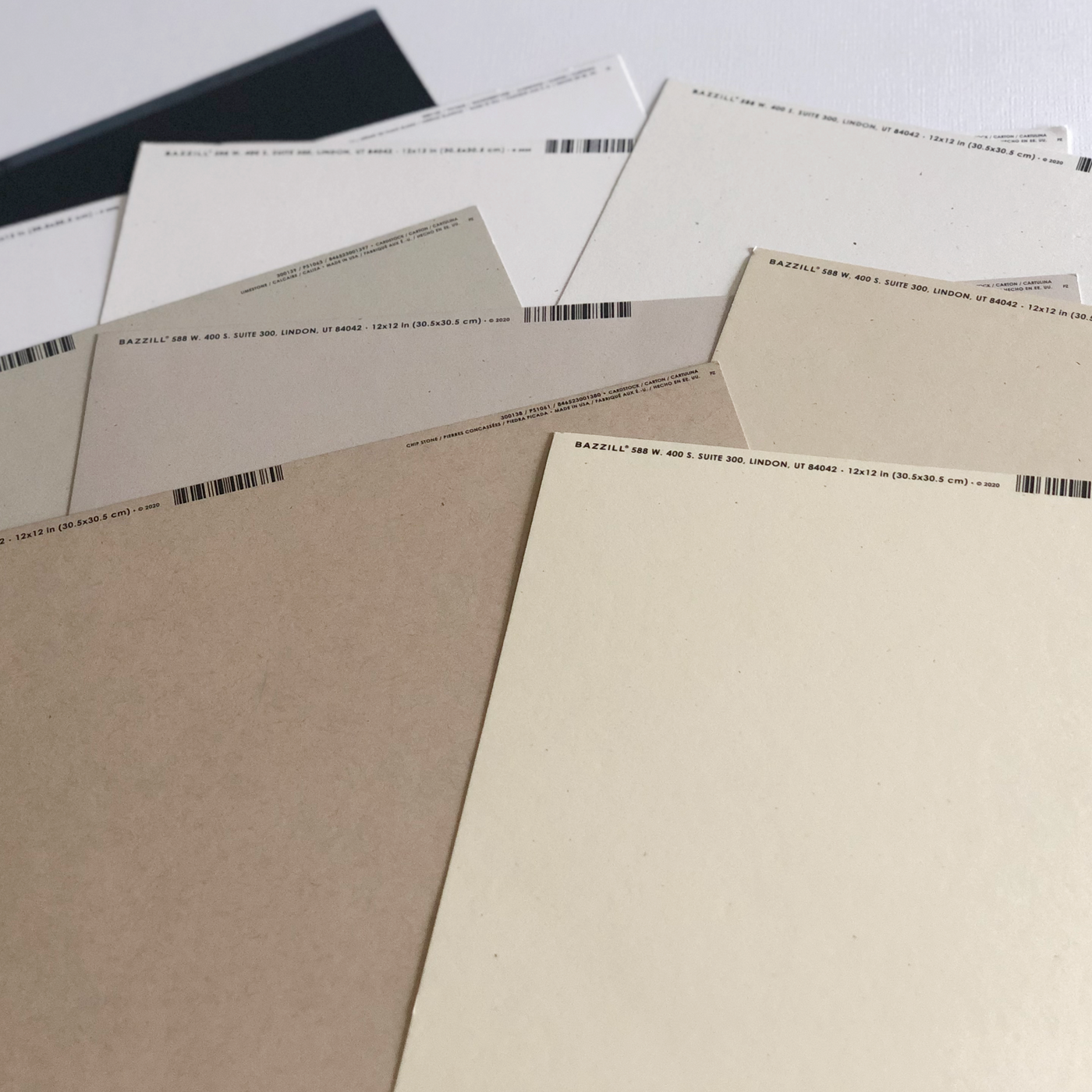 All nine colors of 12x12 cardstock sheets from Bazzill Speckles collection