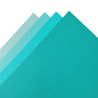 The Turquoise monochromatic assortment includes three (3) each of four (4) shades of turquoise blue colors of Bazzill textured cardstock.